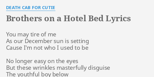 BROTHERS ON A HOTEL BED